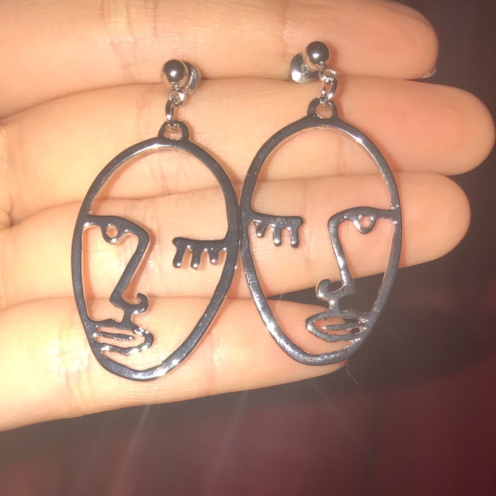 Face earrings silver tone